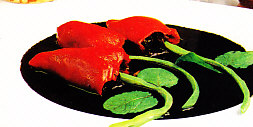 Pimientos rellenos de calamares en su tinta