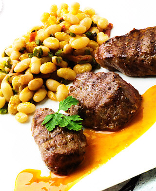 Presa de ibérico con judías blancas