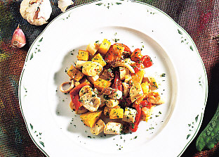 Pulpo guisado con pimientos rojos
