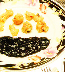 Rape con salsa de calamares
