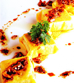 Raviolis de capipota con vinagreta de escalonia