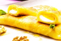 Crêpes de queso y naranja
