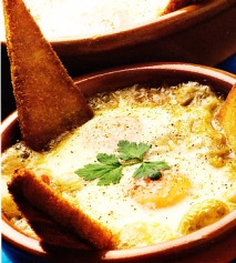Huevos gratinados con salsa bretona