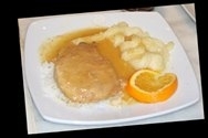 Receta de Lomo de cerdo con salsa de naranja y puré de manzanas