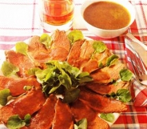 Magrets de pato con salsa de arándanos