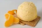 Mandarinas caramelizadas con helado de queso