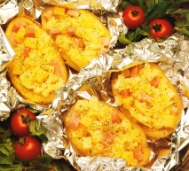 Receta de Patatas rellenas de queso y jamón