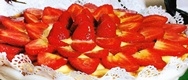 Tarta de crema y fresones glaseados