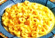 Tortellini con salsa de naranja